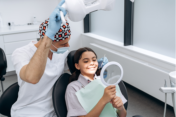 a-young-patient-is-sitting-in-a-dental-chair-the-2024-10-20-09-28-49-utc a-young-patient-is-sitting-in-a-dental-chair-the-2024-10-20-09-28-49-utc